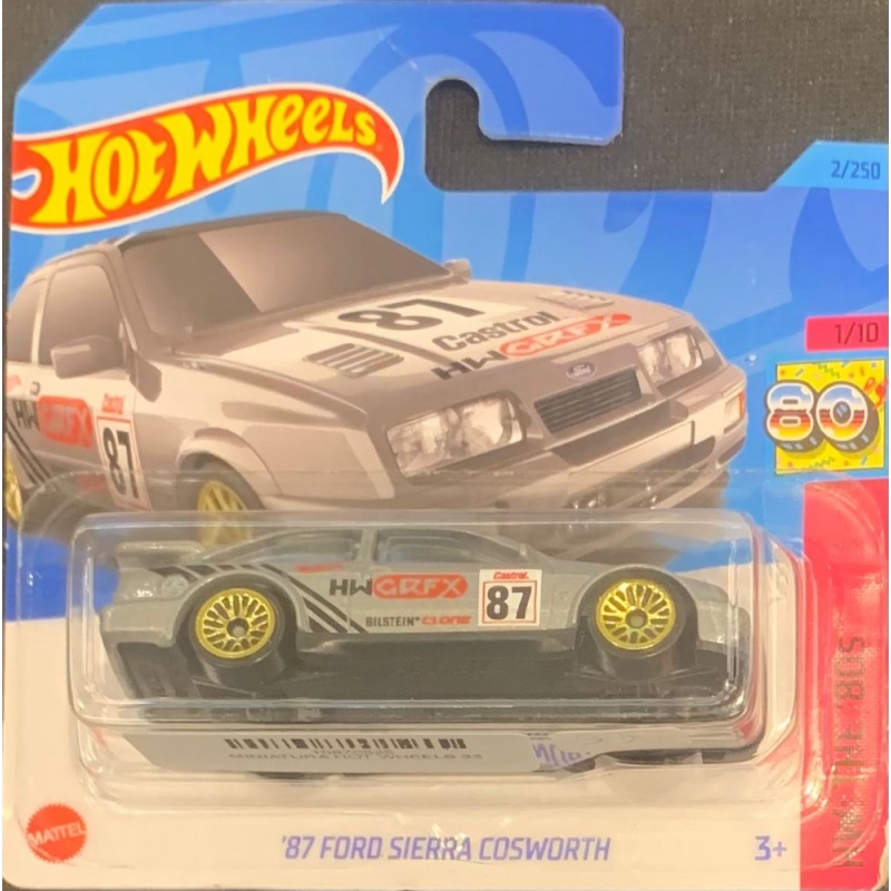 HOT WHEELS - ´87 FORD SIERRA COSWORTH CINZA DE 2021 1/10 COM BISTER PEQUENO