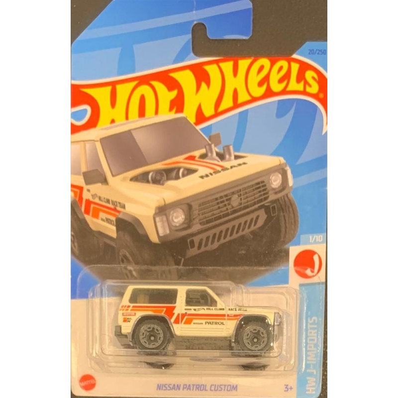 HOT WHEELS - NISSAN PATROL CUSTOM BRANCO DE 2021 1/10 COM BLISTER NORMAL